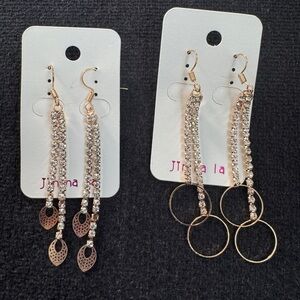 Set of 2 gold tone with faux diamond dangle earrings.
